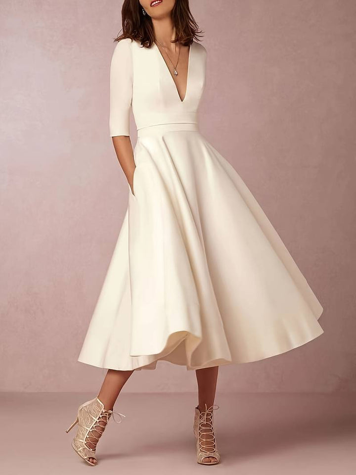 Daisy | Midi Wedding Guest Dress with Plunge V-Neck and Flared Skirt